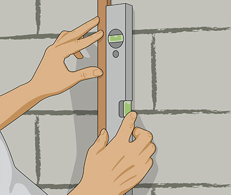Steg 4. Sätt upp trälister (avjämningslister)på väggen använd vattpass.